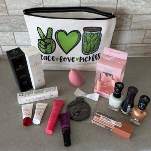 NWT 15 item Beauty Bundle in pickle Makeup bag. Value over $100